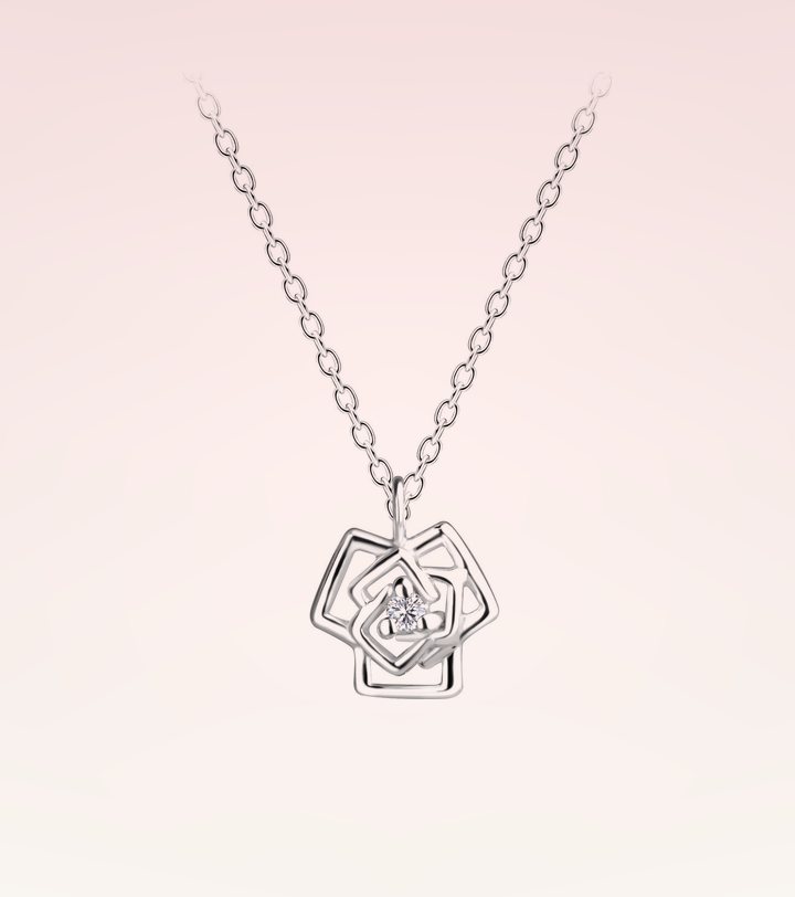 Ruby Folk Rose Necklace in 925 sterling silver with a natural diamond