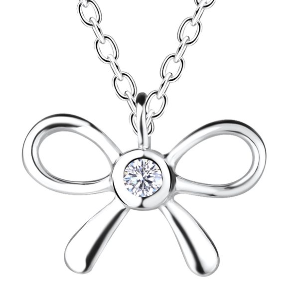 Close-up of the Ruby Folk Bow Necklace showing the natural diamond