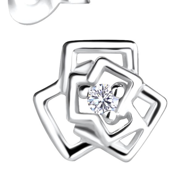 Close-up of the Ruby Folk Rose Stud Earrings showing the natural diamond
